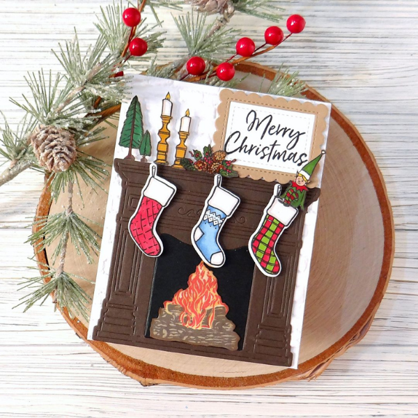 “All the stockings were hung by the chimney with care…” by Kathy